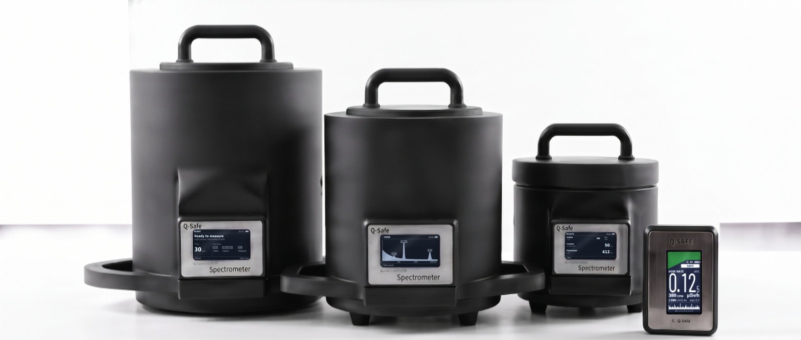 Q-Safe QSF805-A, QSF803-A and QSF801-R food radioactivity analyzers with the QSF104 portable radiation detector